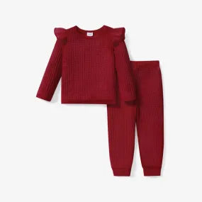 2-piece Toddler Girl Ruffled Textured Long-sleeve Top and Solid Color Pants Set