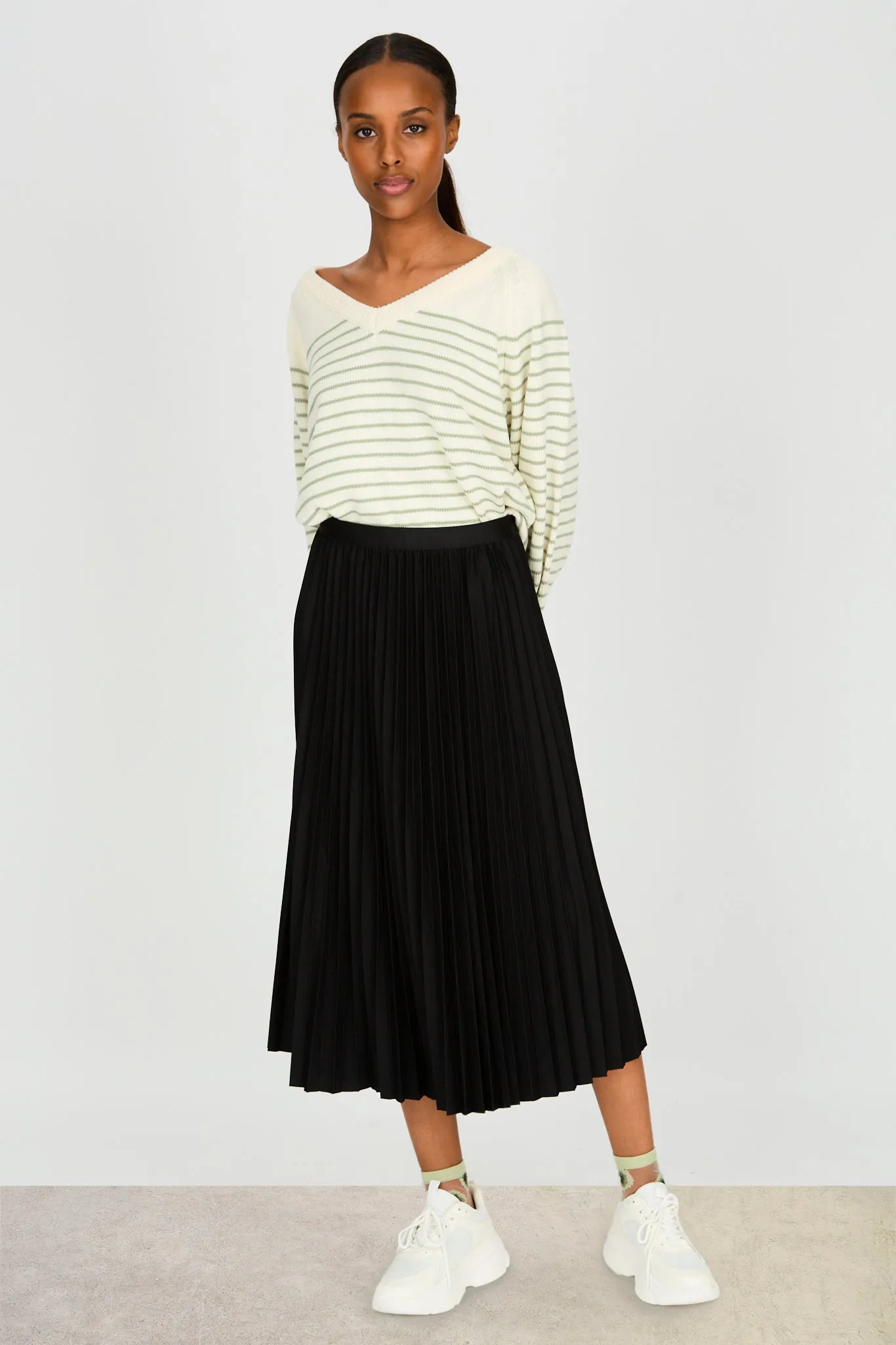 Black slinky pleated skirt