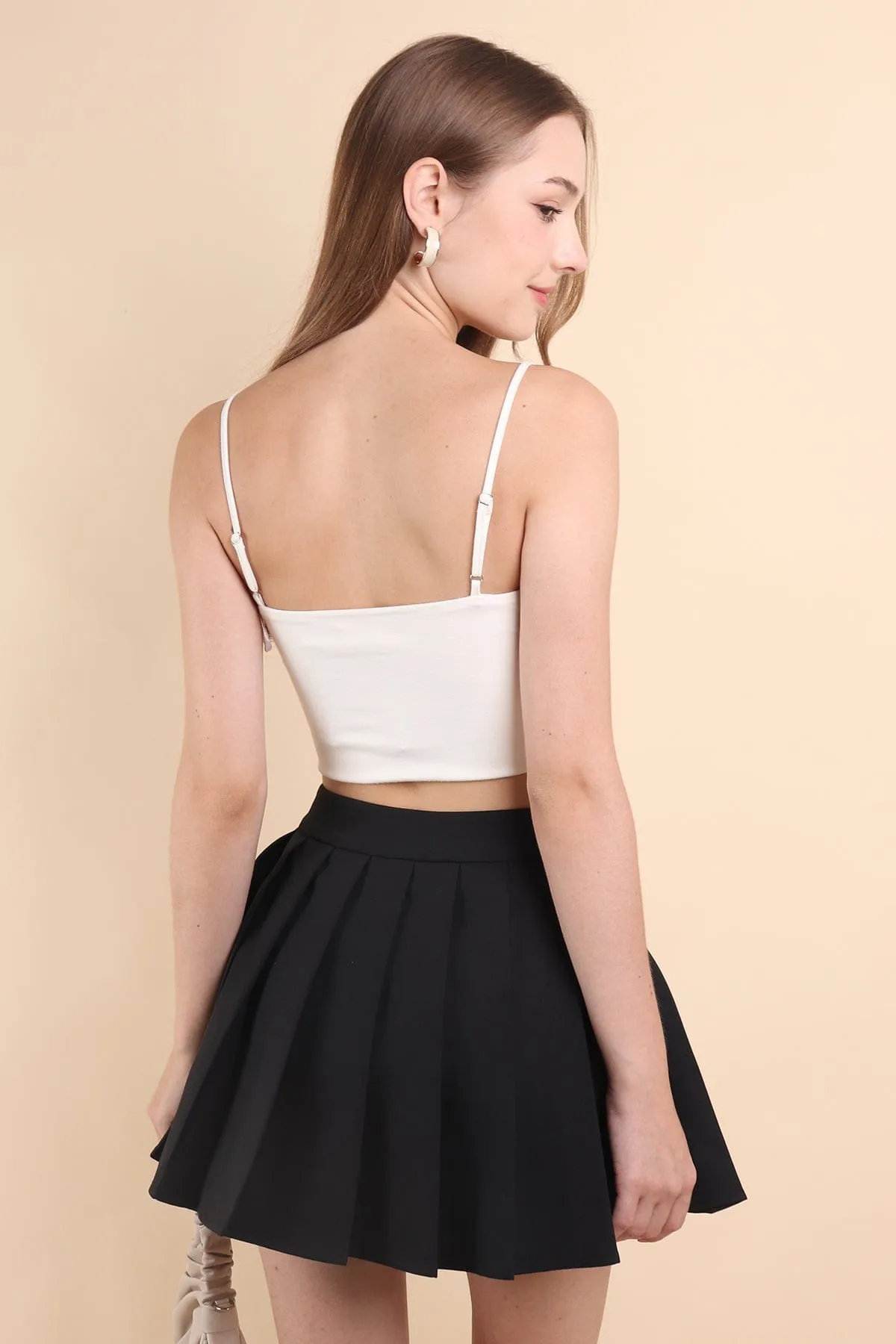 RESTOCKED** CAMU PLEATED SKIRT IN BLACK